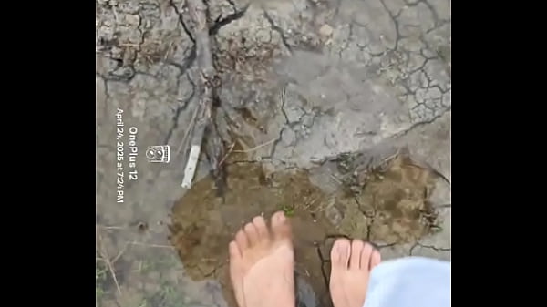 Bare feet playing in the mud