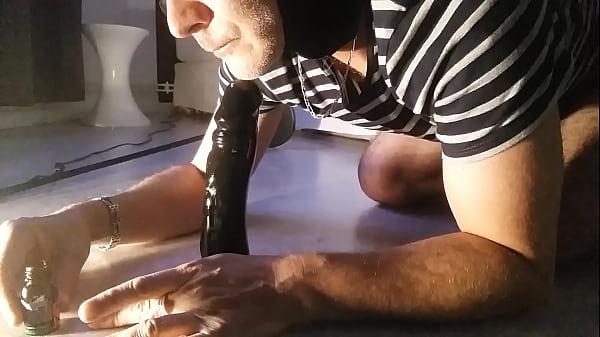 sucking a dildo under p