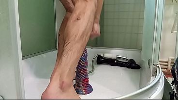 I jump on a big dildo and squirt from my dick
