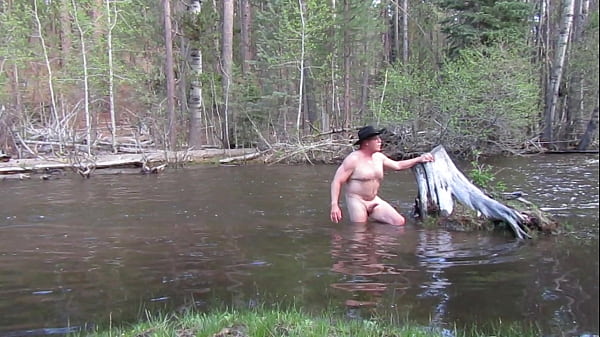 Bathing naked in the river