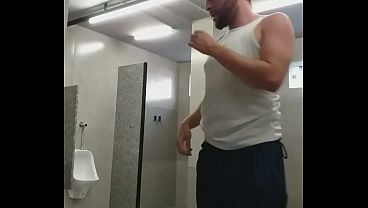 I almost got caught exposing myself in the gym bathroom and the guys almost caught me