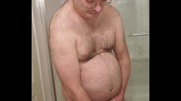 Nude Martin Lavallee mastubates ejaculates and eats his sperm