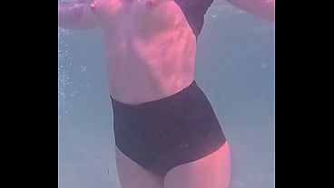Amateur long legs perfect body girl039s relaxing underwater swimming