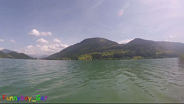 Jerking off underwater and pumping cum into the water in a stunning mountain lake