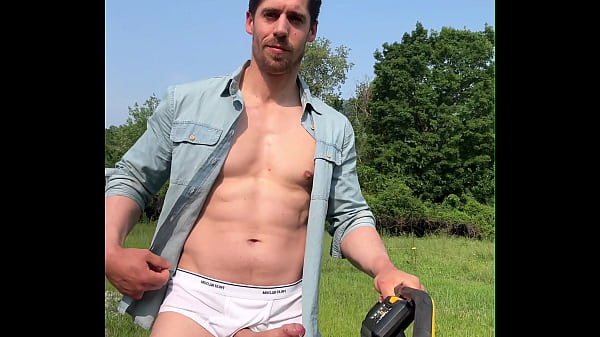 The neighbor is out cutting his lawn again