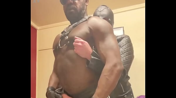 Black Bodybuilder Dominates White Leather Clad Sub in Nipple Play Scenes