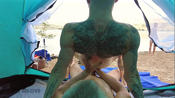 A couple of hot guys have wild sex on a public beach causing vacationers to react aggressively to them