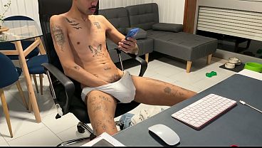 Skinny guy in jeans pulls his dick out and jerks off on webcam