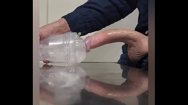 Stroking curved BWC and cumming in clear fleshlight