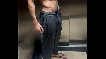 Walking on the beach trail in shorts without underwear  showing off his huge dick 